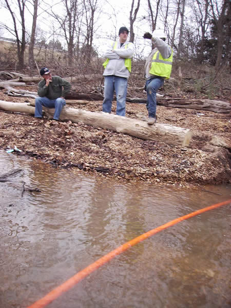 Laying cable under water